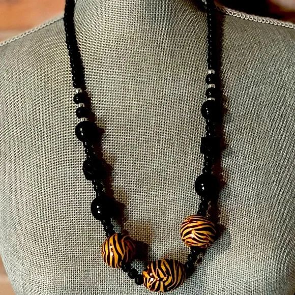 Black and silver bead necklace with accent beads of brown & tan tiger stripes - Picture 1 of 2